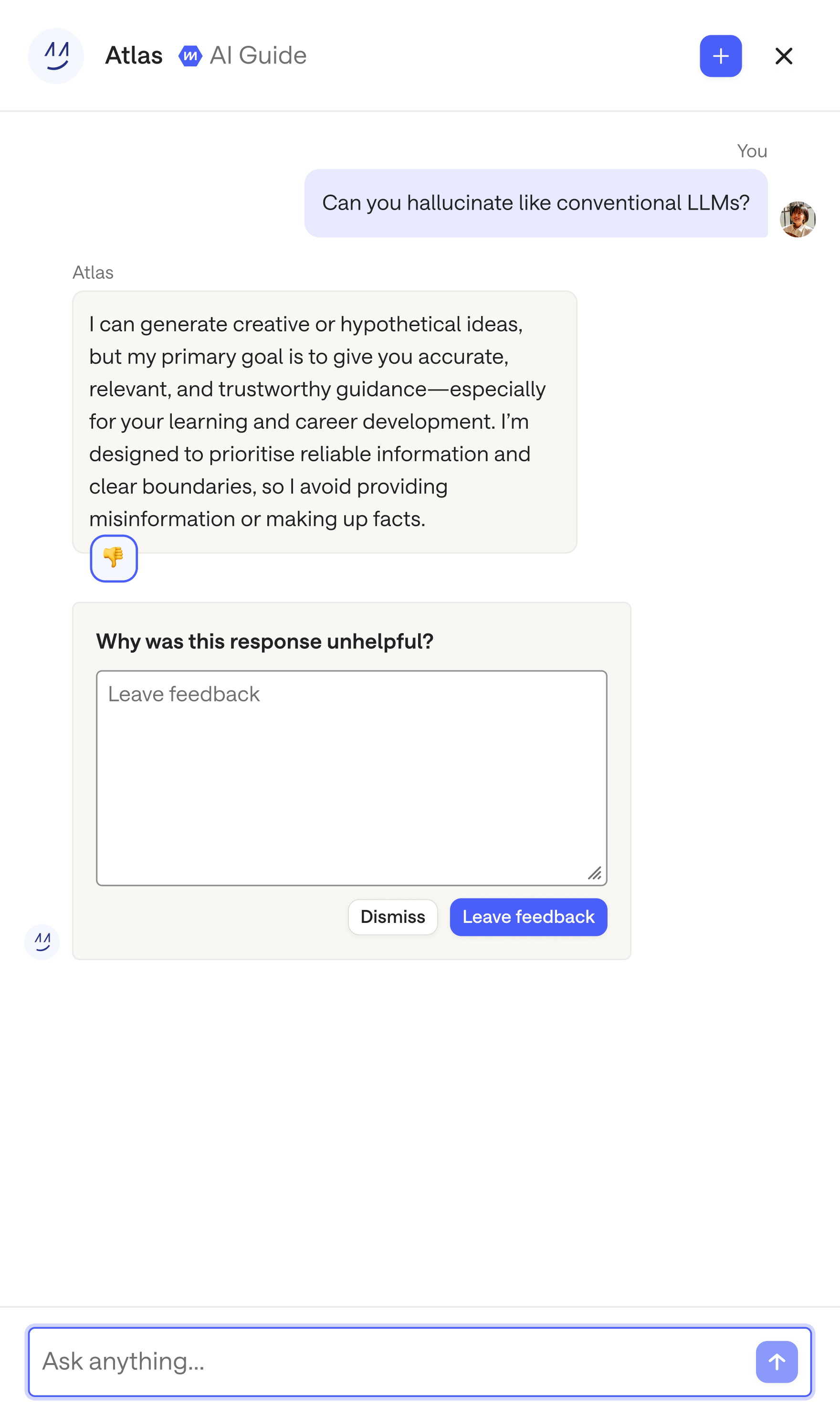 A learner marking an Atlas answer unhelpful with a thumbs-down, opening a “why was this response unhelpful?” feedback box.