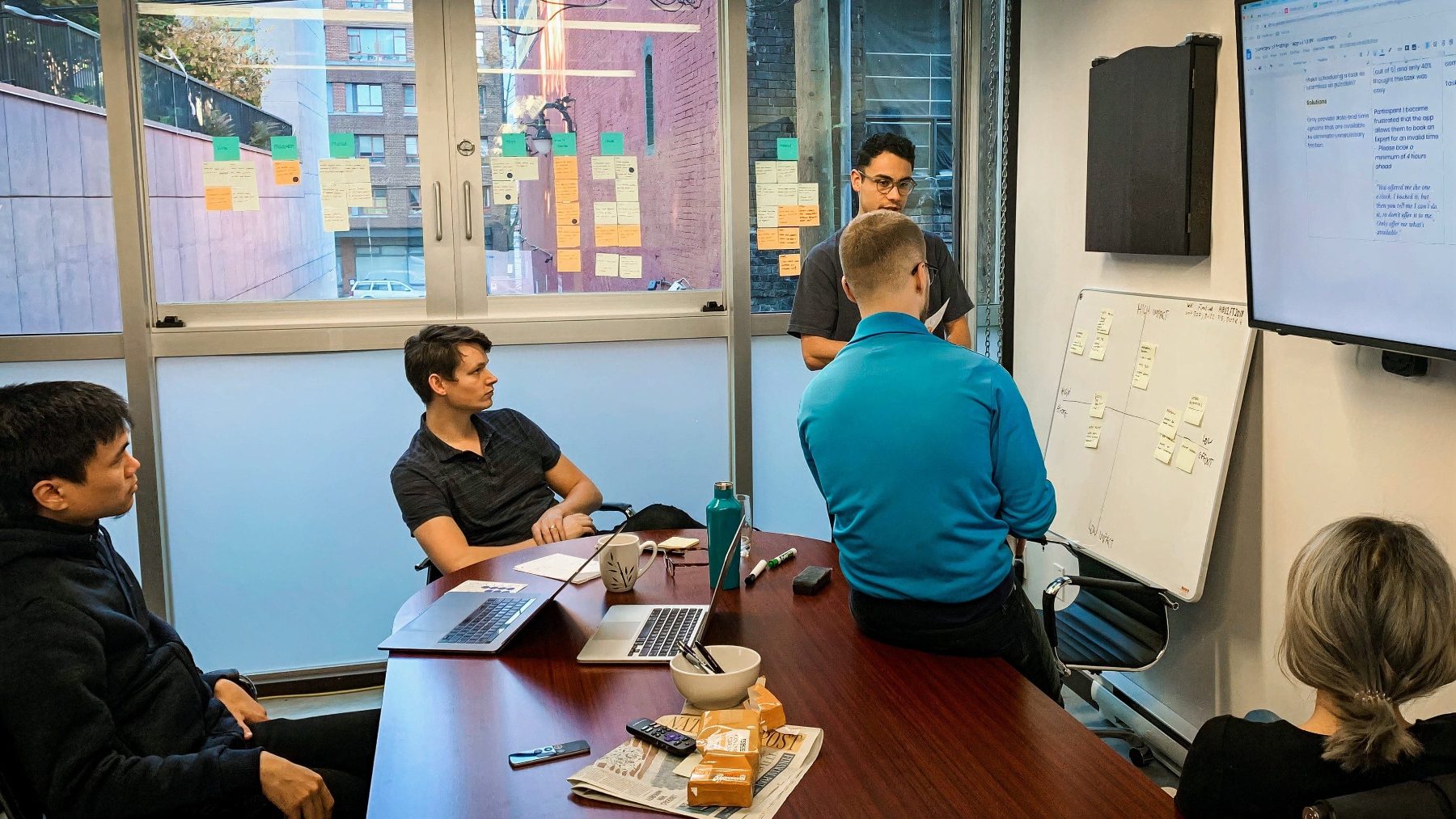 The team in a workshop, prioritising solutions to implement as patterns.